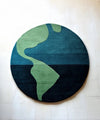 round_blue_hand_tufted_rug
