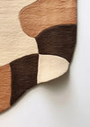 irregular_beige_hand_tufted_rug