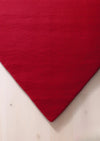 irregular_red_hand_tufted_rug