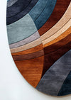 Orion Flow Irregular Hand-Tufted Rug with abstract curved design in rust, navy, and ivory – artisan-made luxury rug by Rugnoor
