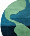 round_blue_hand_tufted_rug