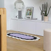irregular_oval_hand_tufted_rug