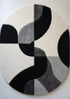 irregular_black_ivory_hand_tufted_rug