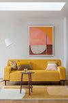 Modern mustard yellow wool rug styled with a yellow sofa and pink artwork