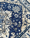 Detail of 20mm thick blue wool fibers in wavy melting rug design