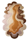 Desert Bloom irregular hand tufted rug with earthy layered design on floor