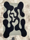 irregular_black_grey_hand_tufted_rug