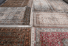 Multiple Persian heritage rugs laid flat showing full colour range including red, ivory, green and blue designs — Rugnoor Persian Heritage Collection