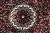Persian heritage rug red medallion close-up with floral motifs and intricate border patterns - Rugnoor