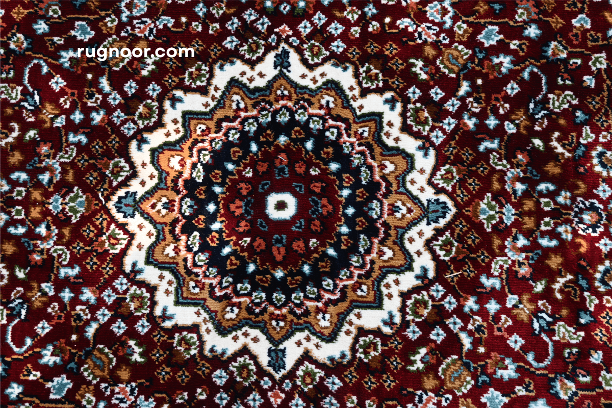 Persian heritage rug red medallion close-up with floral motifs and intricate border patterns - Rugnoor