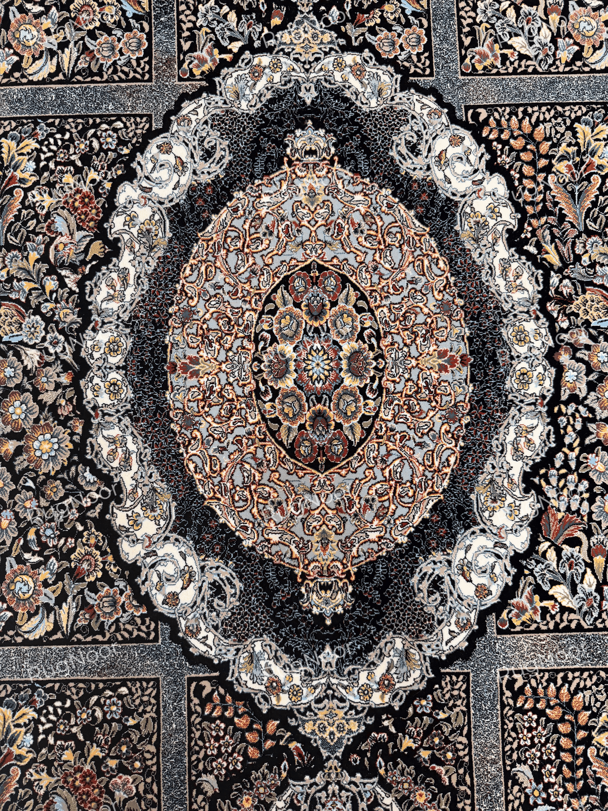 Close-up of the central oval medallion surrounded by intricate floral detailing by RugNoor