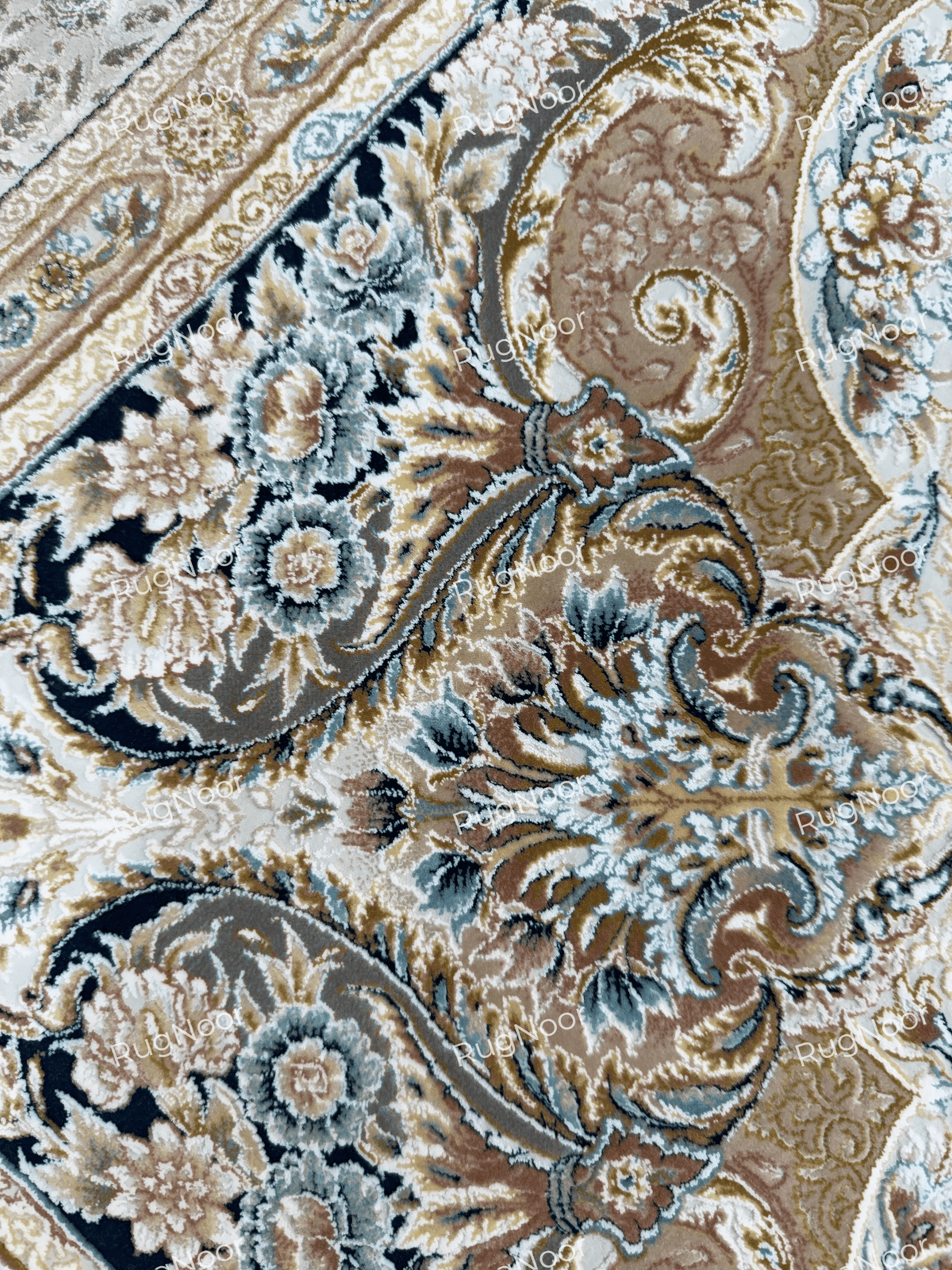 Close-up of Warda's scrolling floral motifs in beige, ivory, grey and muted blue, RugNoor.