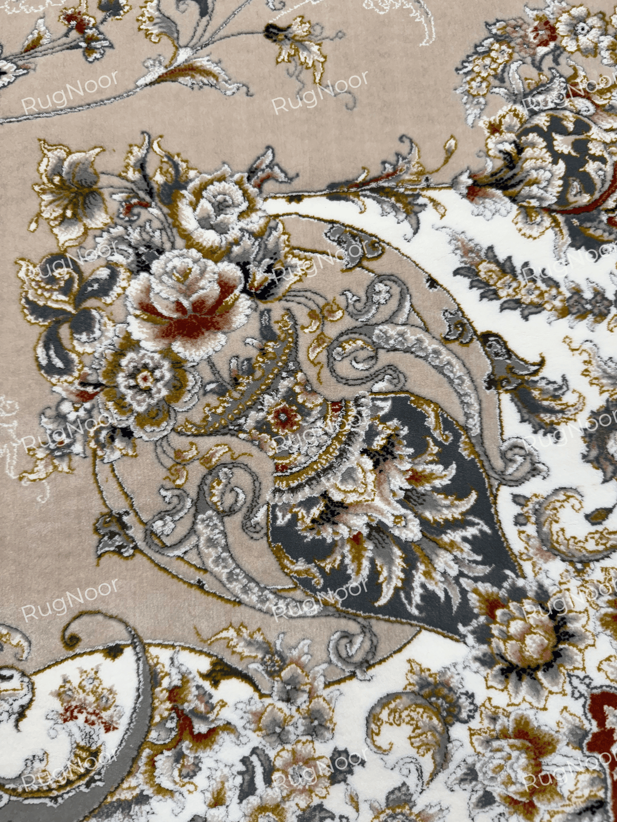 Close-up of Urkeed rug's scrolling floral details