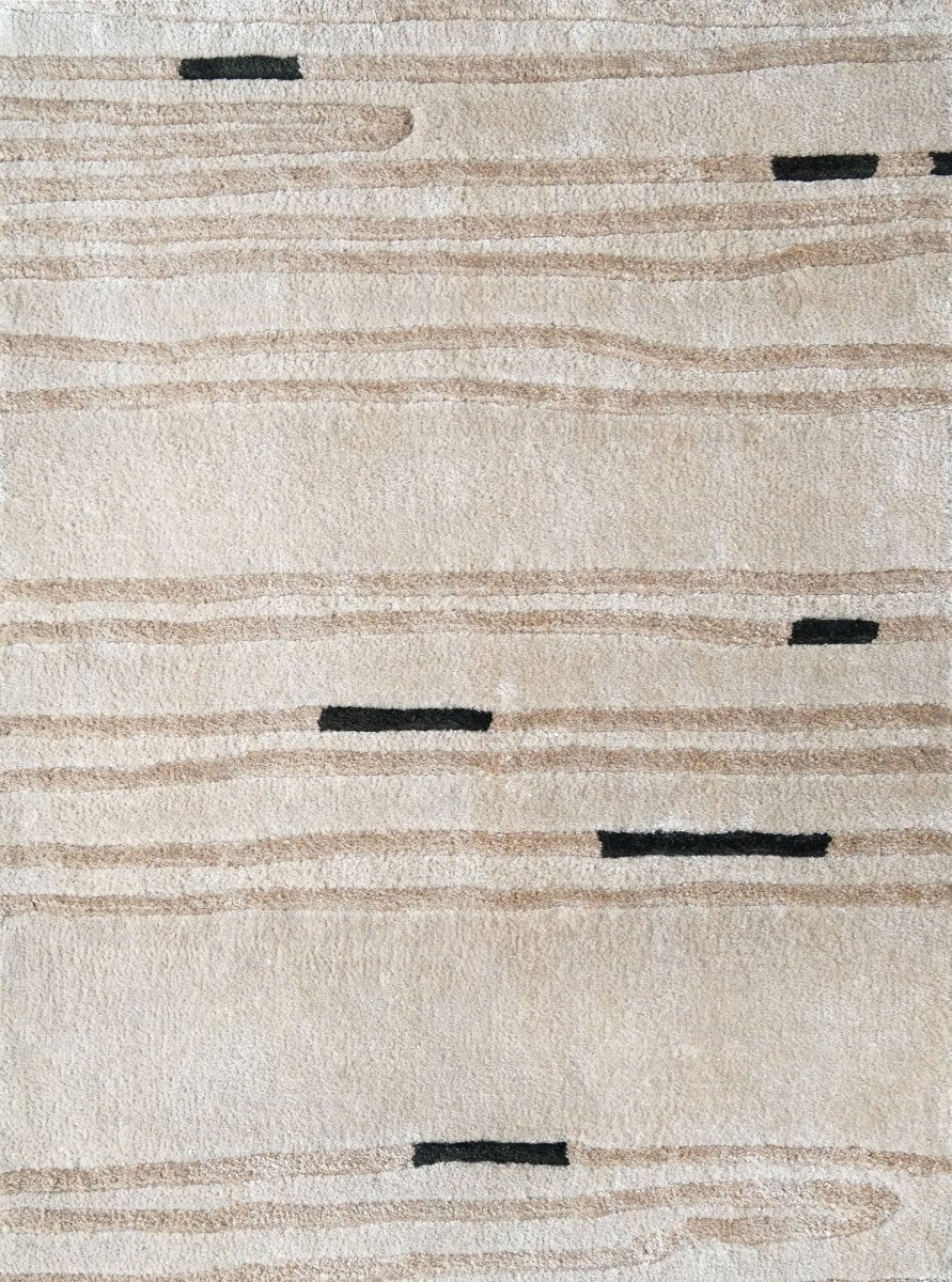 Bastien hand tufted contour line wool rug in ivory with flowing organic beige and charcoal detailing.