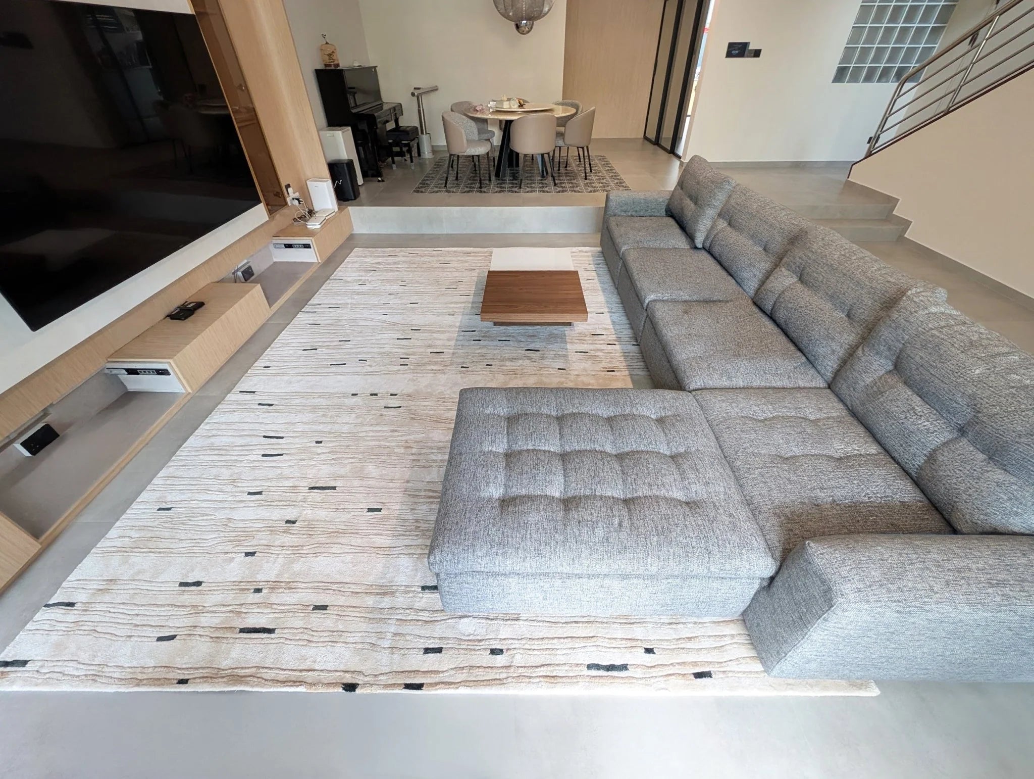 Bastien contour line wool rug styled in a modern living room.