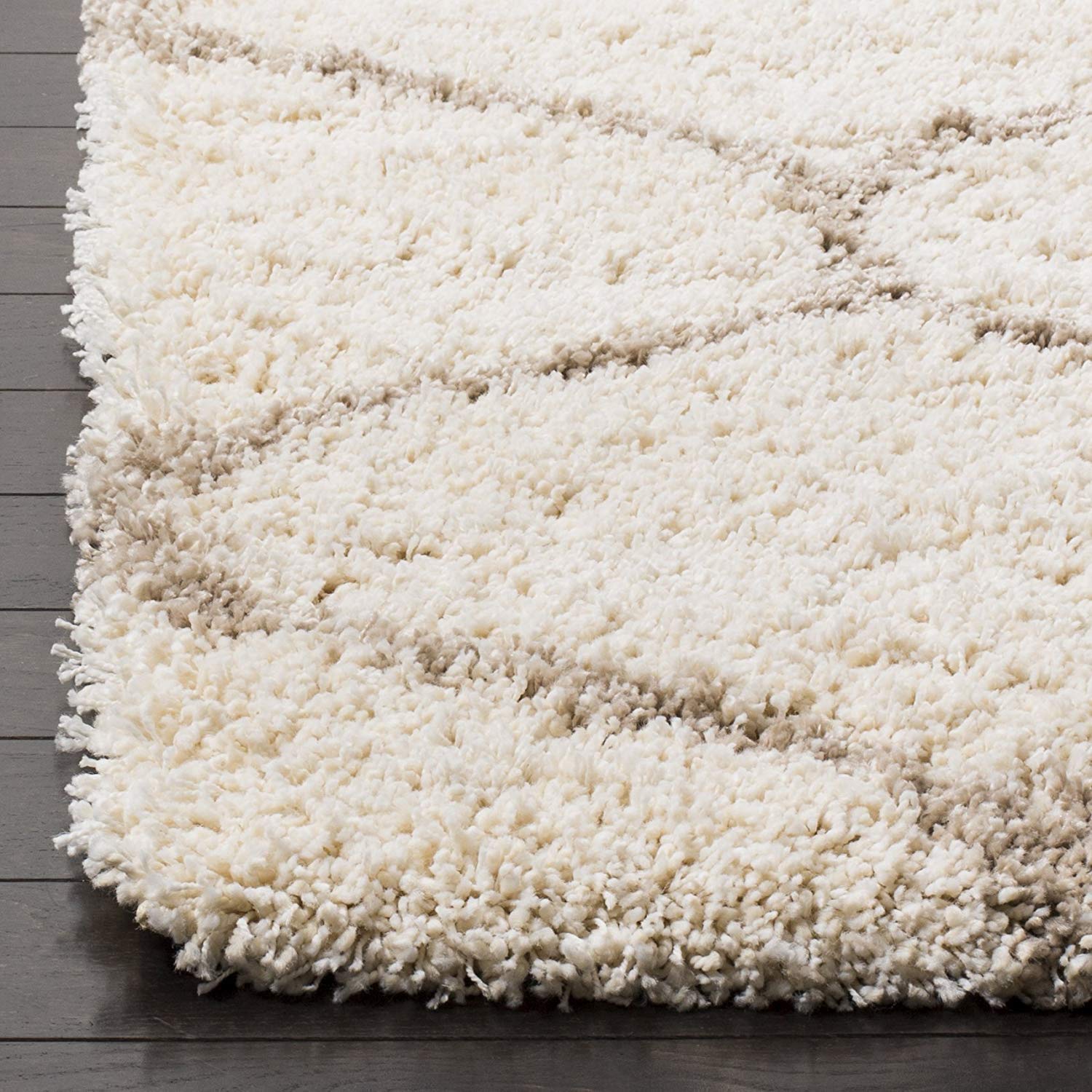 Beige shaggy rug on a wooden floor