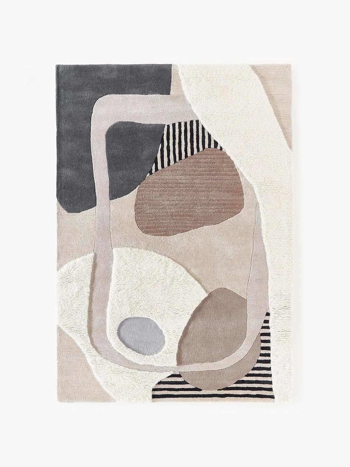 Hand tufted abstract wool rug featuring sculptural organic shapes, flowing contours, and neutral colour blocks.