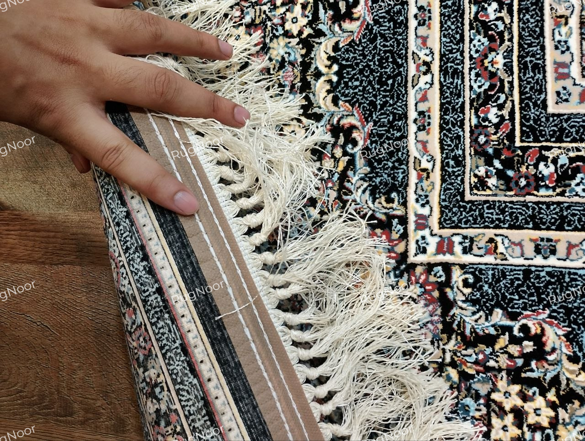 Azrinah ivory medallion carpet showing its decorative ivory fringe and finely patterned border.