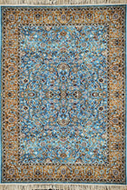 Almas Royal Floral Rug with blue field, intricate floral motifs, ornate border and fringe