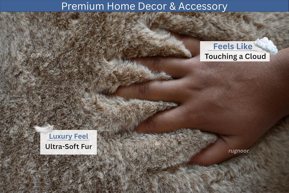 Close up of a hand pressing into a light beige faux fur rug highlighting its ultra soft plush texture and thick high pile fibers