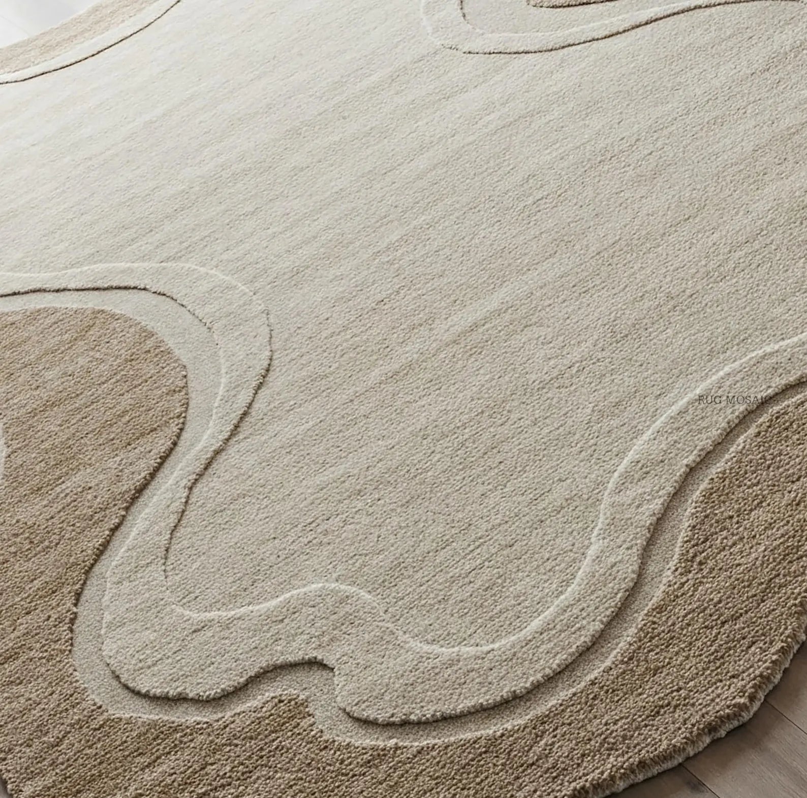 A close-up of a plush area rug with an abstract, wavy organic pattern in layered shades of beige and cream.