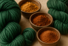 Close-up of lush green wool yarn and eco-friendly natural dyes, earthy bowls of pigment beside soft rolled yarn, textures of fibers highlighted, organic aesthetic, warm neutral background, high detail.
