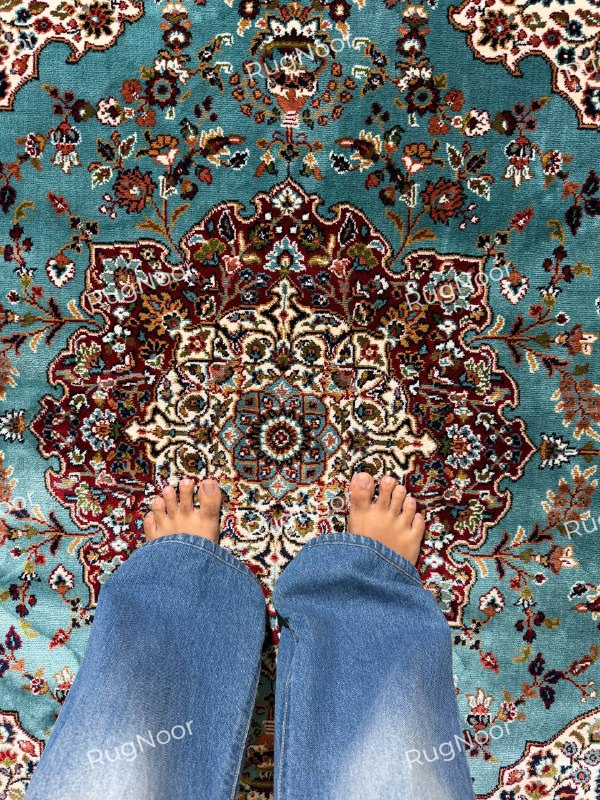 Round turquoise traditional rug with ivory medallion, burgundy floral borders and cream fringe - Fayruz RugNoor