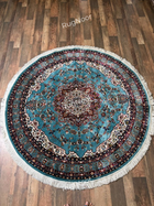 Complete view of Fayruz round traditional rug with turquoise field, multicolour floral medallion and layered ornamental borders - RugNoor