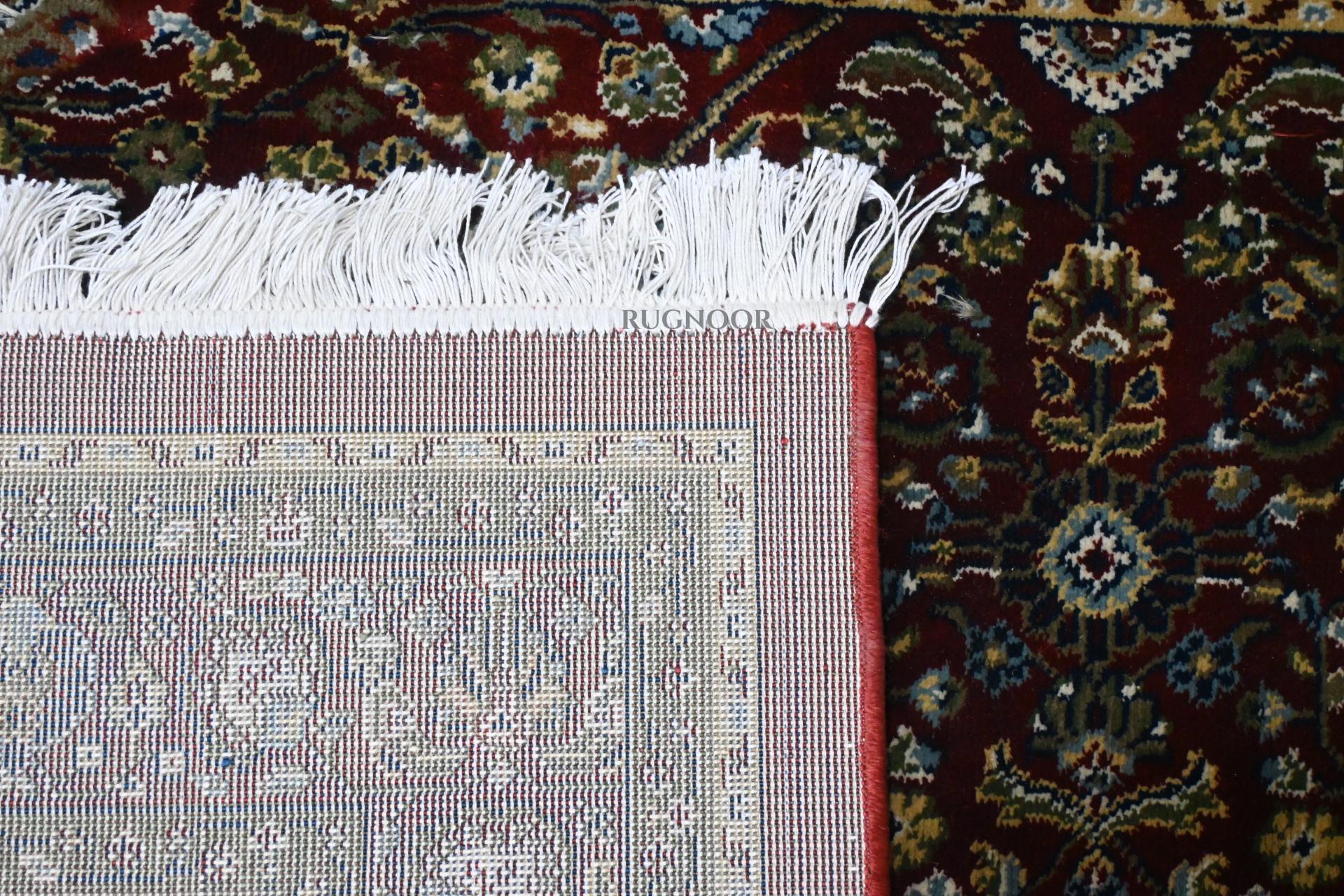 backing-fringe.jpgBack corner of Firman Persian rug showing durable woven backing and hand-finished ivory cotton fringe