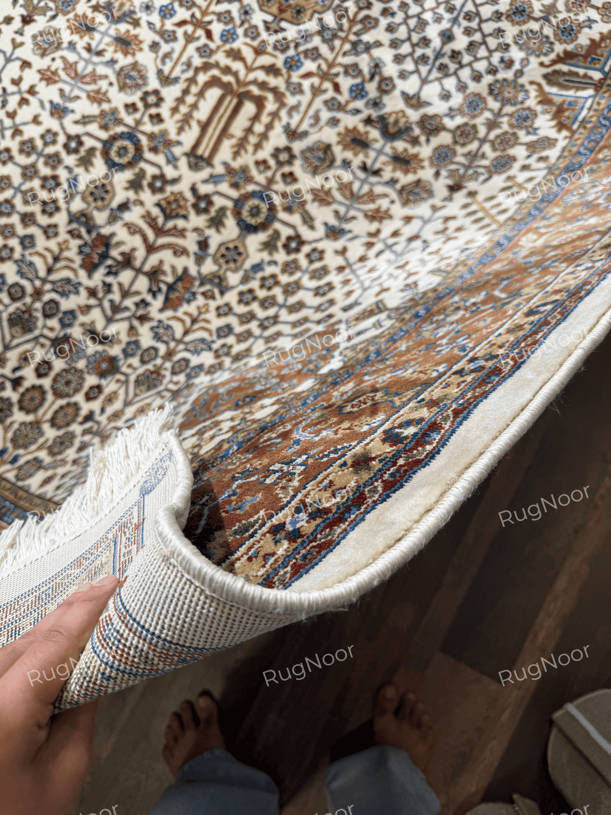 Close-up of ivory fringe and finished border on the traditional floral rug - Ghazal RugNoor