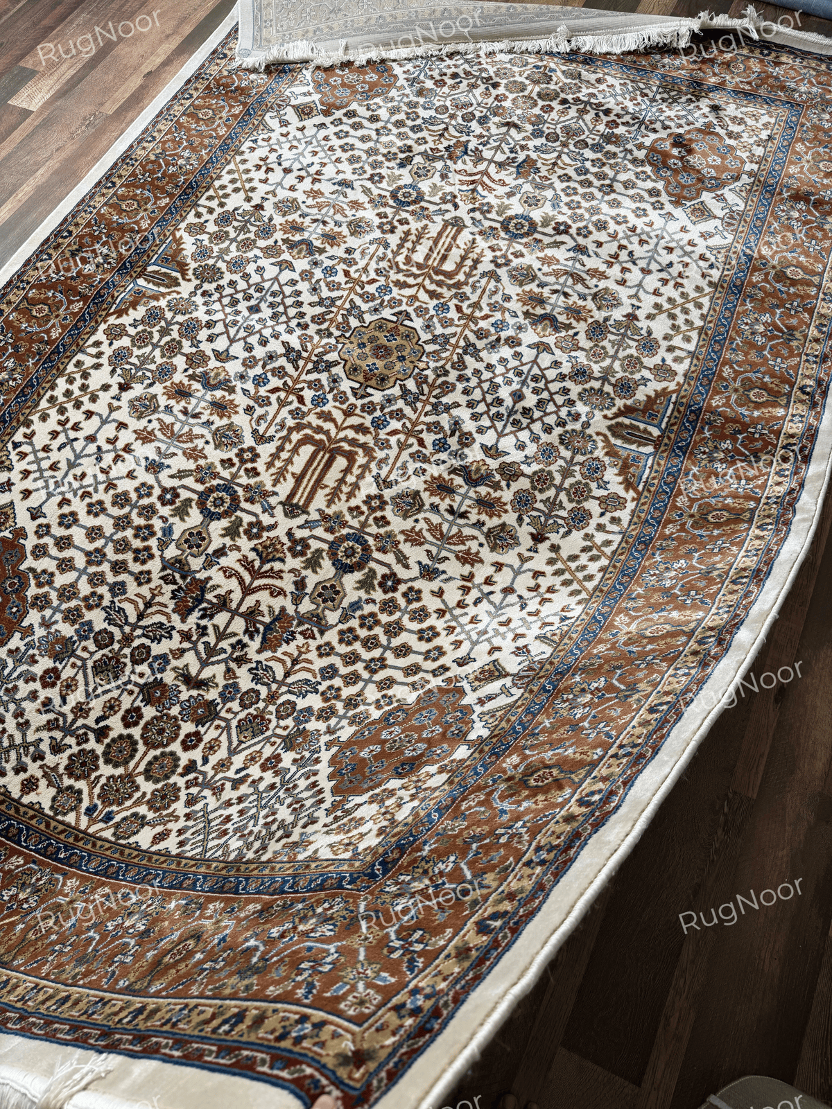 Detailed symmetrical floral pattern with cream, rust-brown and muted-gold accents - Ghazal RugNoor