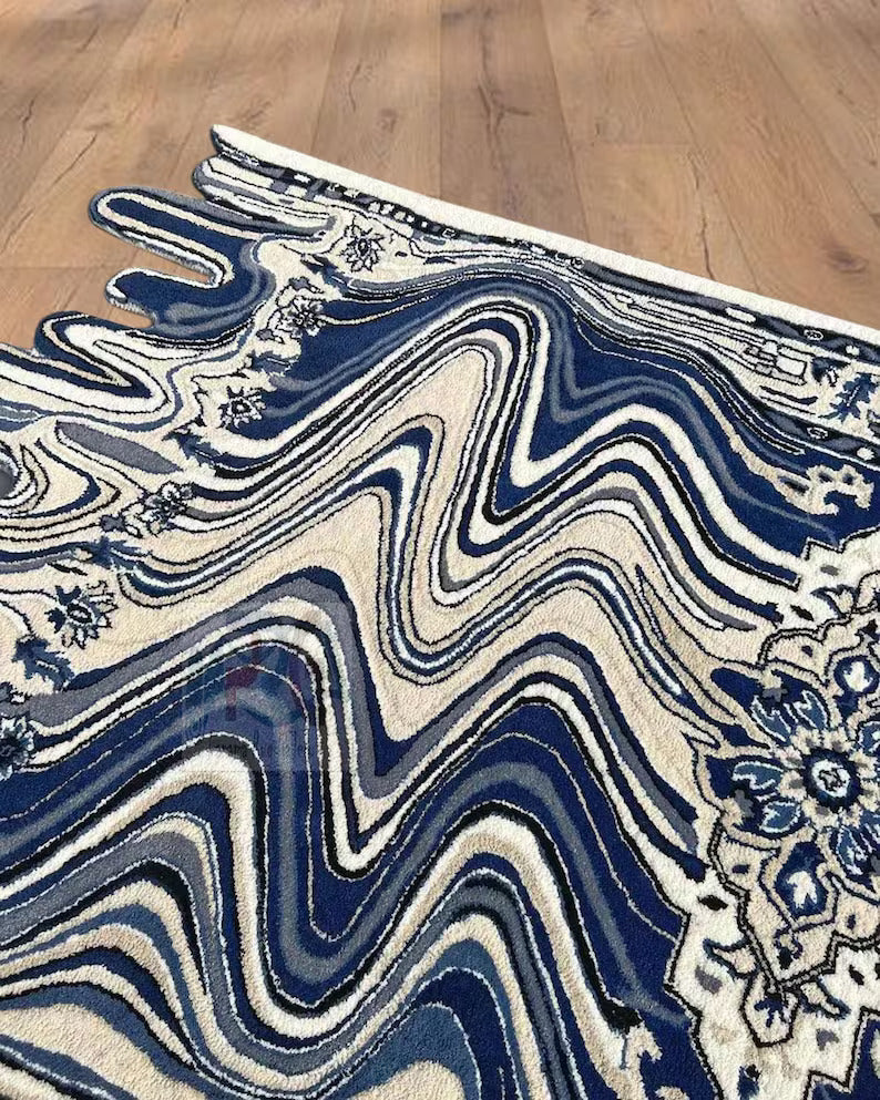 Detail of 20mm thick blue wool fibers in wavy melting rug design on the floor