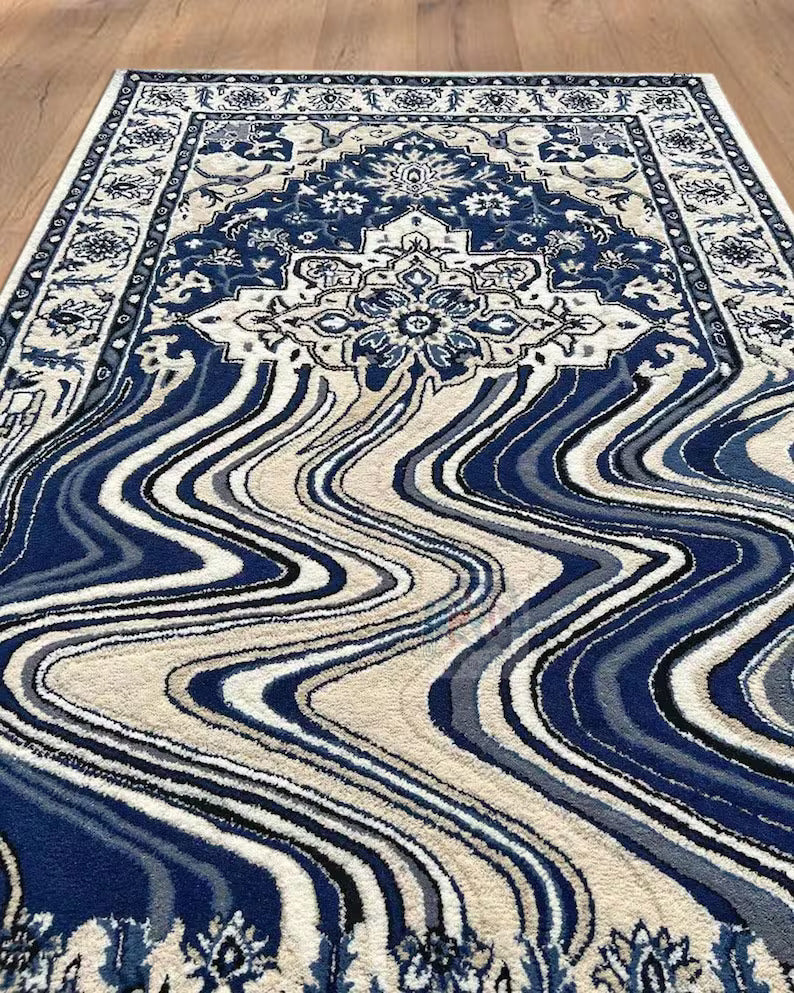  Blue wool fibers in wavy melting rug design on floor