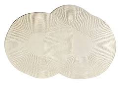Irregular-shaped tufted rug made from wool and silk-viscose blend