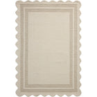 A rectangular area rug with a scalloped border and a subtle striped pattern, shown flat against a white background.