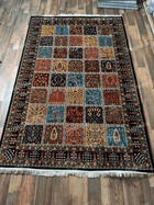 Traditional patchwork rug with varied floral panels and ivory fringe - Kashida RugNoor