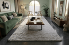 ultra soft light grey faux fur area carpet in modern living room with green sofa – RugNoor
