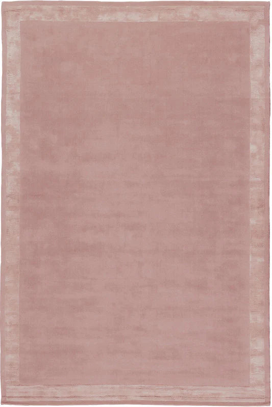 Dusty pink hand-tufted wool rug with tonal border design, flat lay view