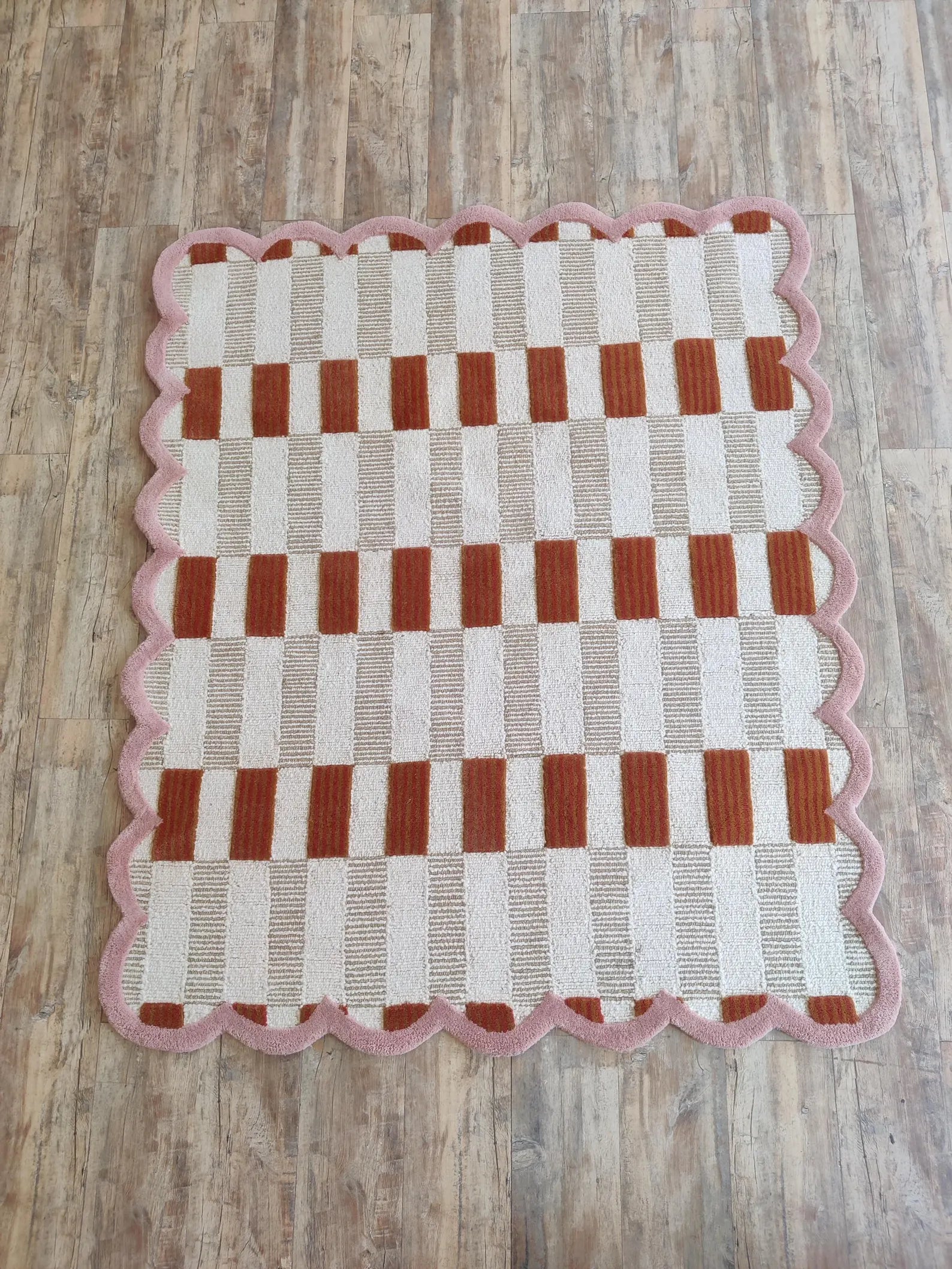 pink scalloped rug carpet