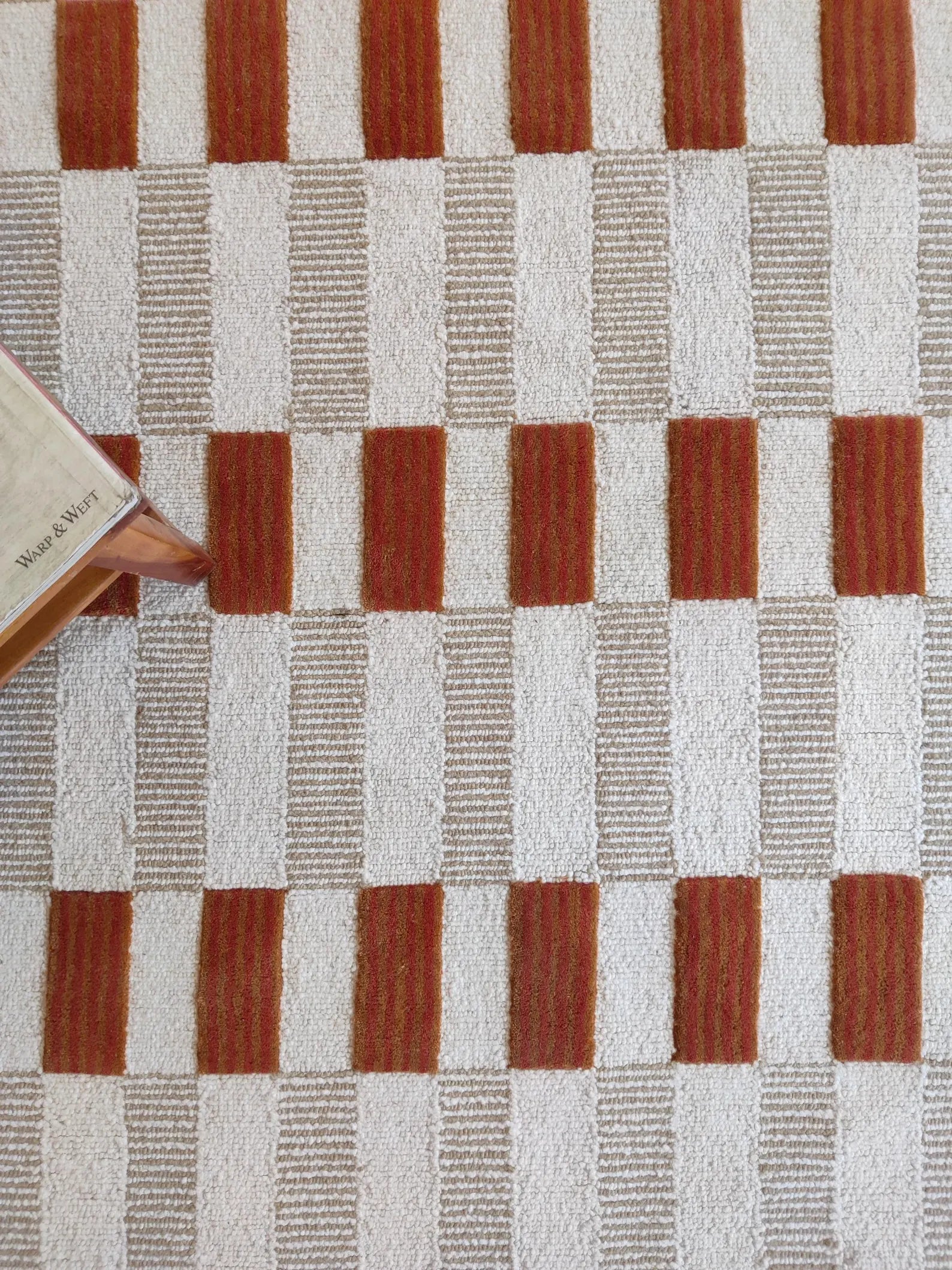 closeup of pink scalloped rug carpet