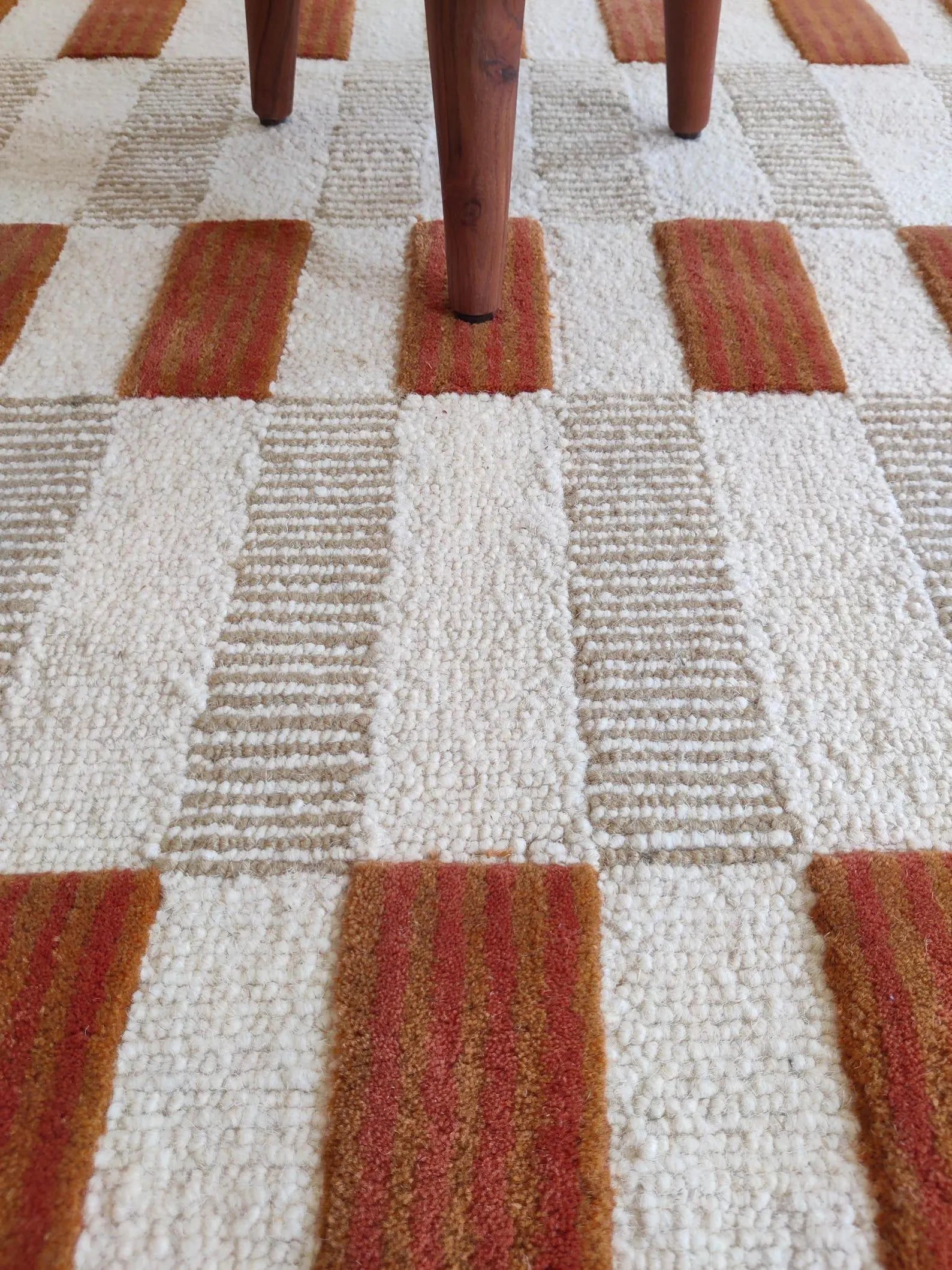 closeup of pink scalloped rug carpet