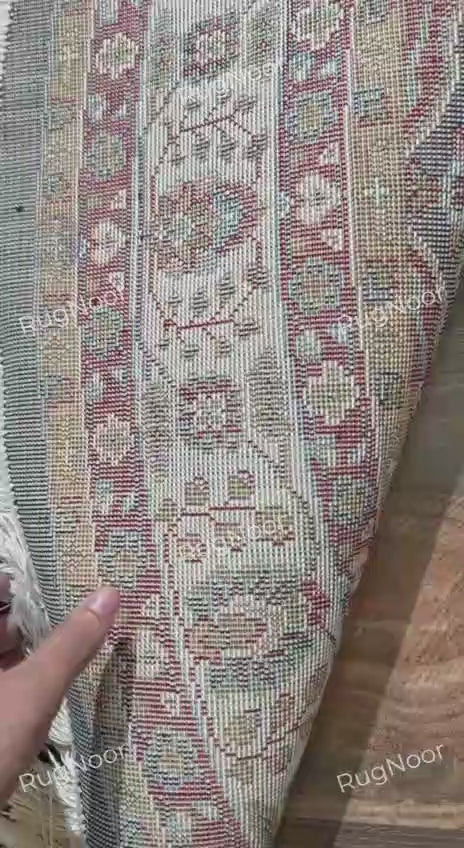 backing of tiraj round traditional rug