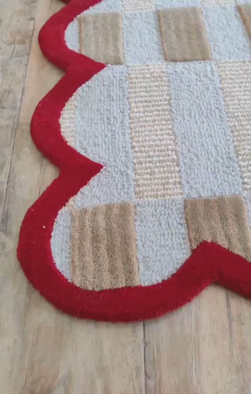 A woven checkered rug carpet with a bold red finish.