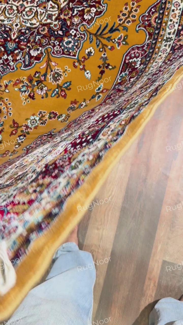 Close-up of mustard gold floral field and ornate burgundy, cream and navy border - Shams RugNoor
