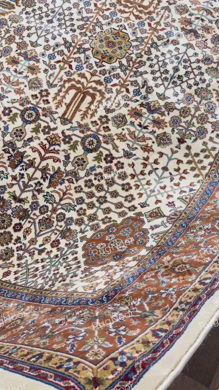Close-up of the rug's finished edge and ivory pile - Ghazal RugNoor