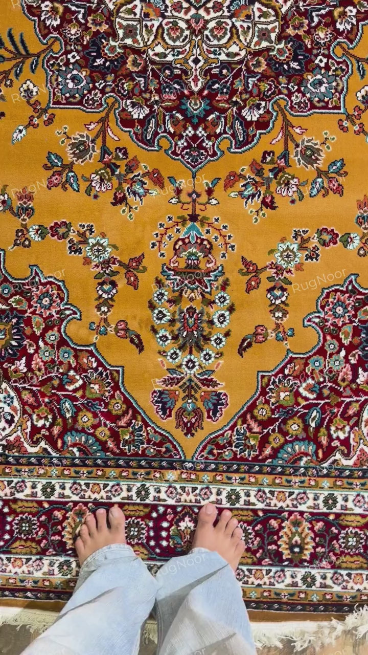 view of mustard gold rug with ornate burgundy medallion, floral motifs and ivory fringe - Shams RugNoor