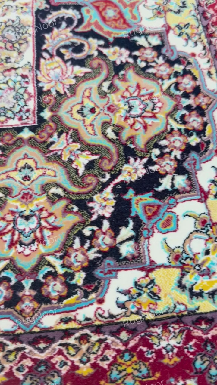 Detailed view of the cream floral border and dark decorative inner band