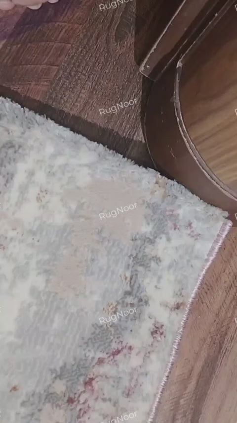 Video showing the underside backing and construction of the Amselle modern abstract rug.