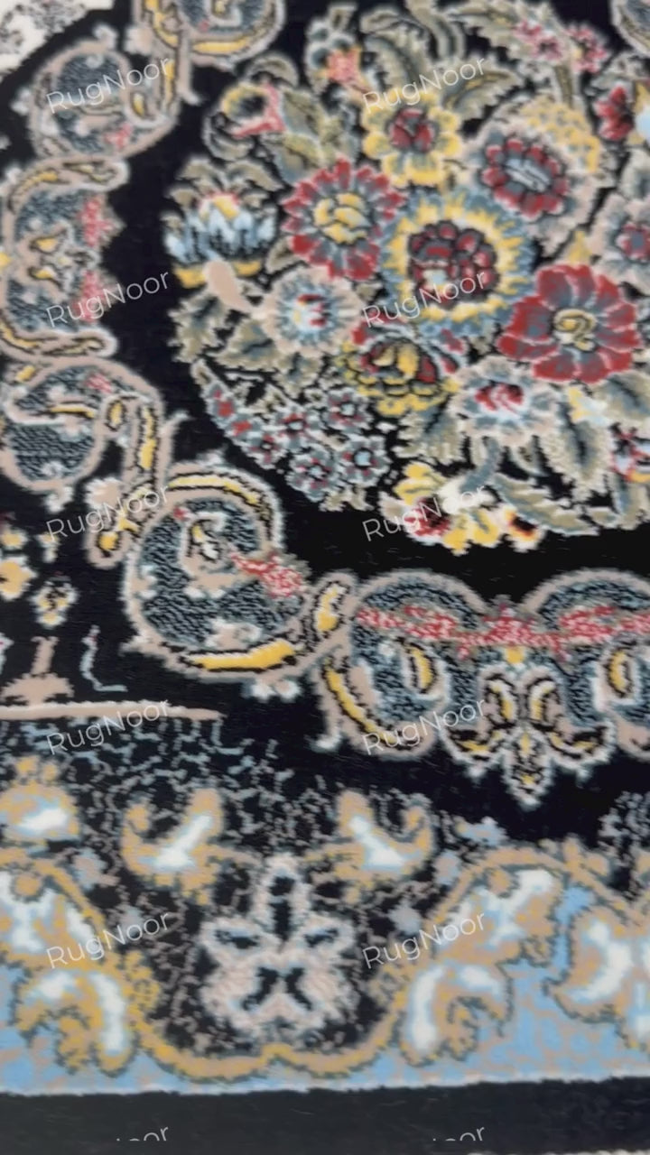 Close-up of a decorative floral panel with cream, blue, rose, and gold accents on black by RugNoor
