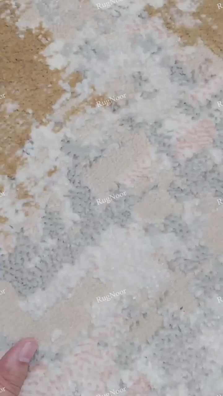 Close-up video of the Crossfade rug's soft surface texture and subtle viscose sheen as the viewing angle changes.